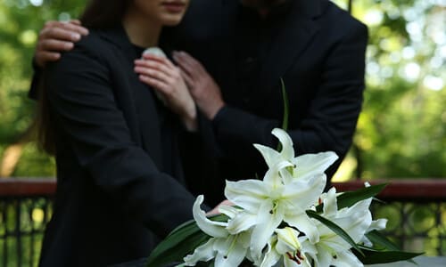 A couple mourning the loss of a loved one who passed in a fatal car accident.